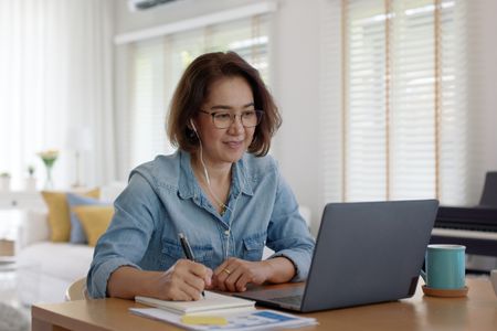 Business owner reviewing their year-end documents with their accountant